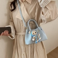 Light blue retro crossbody bucket bag with cute plush bear charm in soft matte finish - Blue with Charm