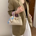 Elegant cream beige crossbody bucket bag with metal buckle and cute bear charm detail - White with Pendant
