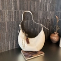Chic cream white croissant shoulder bag with chocolate charm and Love & Desire logo - White
