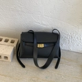 Classic black matte leather crossbody bag with a polished rectangular gold lock - Black