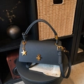 Chic black litchi grain small square bag with knotted handle and star pendant accessory - Black with Pendant
