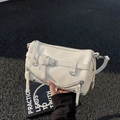 Chic cream white motorcycle style bowling bag with silver zipper and ring details - White