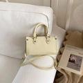 Borsa a mano Boston giallo crema con motivi di cani a rilievo e tracolla rimovibile - Giallo senza ciondolo