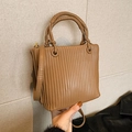 Brown pleated vintage shoulder bag with woven handle and elegant gold hardware - Brown