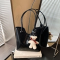 Chic black glossy tote bag with minimalist slim straps and a cute plush bear charm - With Pendant / Black