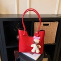Glossy bright red tote bag with a cute bear charm, ideal for shoulder or hand carry - With Pendant / Red