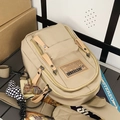 Beigefarbener Nylon-Rucksack mit goldenen Reißverschlüssen und Schachbrett-Anhänger - Mit Anhänger / Khaki
