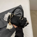 Elegant black suede Boston bag with gold zippers and a cute plush keychain charm - Black With Pendant