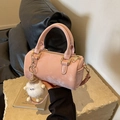 Pale pink Boston handbag in matte faux leather with a plush charm and shoulder strap - Pink With Pendant
