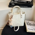 Sac seau chic blanc crème avec pendentif ours et logo MIAOSHE pour femme à la mode - Blanc