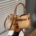 Vintage canvas tote in beige and brown with a unique wooden bead charm and metal clasp - Beige With Charm
