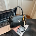 Chic black small leather crossbody handbag with colorful beaded tassel charm and silver buckle - Black