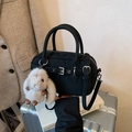 Vintage black Boston bag with decorative straps and a cute white bunny keychain charm - Black With Pendant