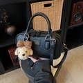 Classic black leather-look crossbody bag with cute puppy charm and adjustable strap - With Charm / Black