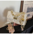 Detail of white quilted leather bag with gold chain strap and adjustable ball ornament - Off White