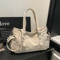 Fashionable beige nylon tote bag with silver metal buckles and functional side pockets - White