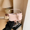 Pale pink leather half-moon crossbody bag with a cute plush bear charm and gold lettering - With Pendant / Pink