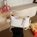 Minimalist cream white crossbody bag with gold twist lock and polka dot plush charm - With Pendant / Off White