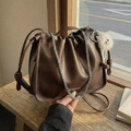 Dark brown ruched cloud bag with silver chain strap and white furry monster charm - Coffee with Pendant