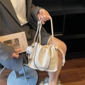 Chic cream ruched cloud crossbody bag with silver chain and cute monster plush charm - Beige With Charm