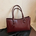 Elegant dark red tote bag with glossy wrinkled texture and shoulder straps for women - Red
