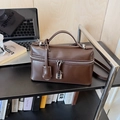 Minimalist deep brown leather vanity bag with silver lock and dual zipper closure - Brown