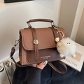 Retro color-block crossbody bag in light and dark brown leather with a plush charm - With Pendant / Brown