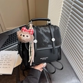 Vintage black backpack with marble texture flap and a cute pink bear keychain charm - Black with Pendant