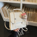Chic cream white PU leather mini backpack with textured finish and elegant flap closure - Cream White With Pendant