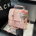 Pink patent leather mini backpack with a plush bear charm and silver twist lock - Pink with Pendant