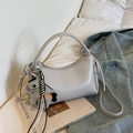 Chic light grey half-moon handbag with horse charm and adjustable cross-body strap - Gray With Pendant