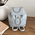 Chic light blue PU leather backpack with silver chain details and metal twist lock closure - Blue