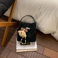 Elegant black matte bucket bag with silver metal clasp and cute plush bear charm - Black With Pendant