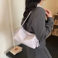Chic light purple patent leather shoulder bag with glossy finish in underarm style - Purple