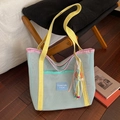 Blue mesh tote bag with yellow straps and a colorful bohemian tassel charm accessory - With Pendant / Blue