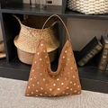 Vintage brown suede shoulder bag featuring gold stud accents and bohemian tote style - Brown