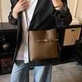 Classic dark brown leather tote bag with lychee texture and adjustable shoulder strap - Brown