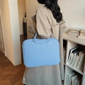 Quilted light blue laptop tote bag with handle and outer pocket for daily commuting - Blue