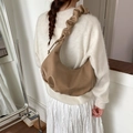 Chic khaki pleated croissant bag shown on model with stylish casual shoulder strap design - Khaki