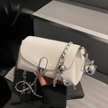 Elegant white crossbody chain bag with silver spherical charm and metal turn-lock - Cream White With Pendant
