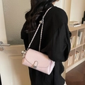 Pink PU leather crossbody bag with silver chain strap and balloon rabbit charm - Pink with Pendant