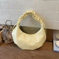Minimalist pleated crescent bag in light yellow PU leather with drawstring bow detail - Yellow