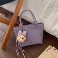 Chic purple bucket tote bag with lychee texture and a cute teddy bear charm - Purple