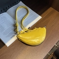 Minimalist bright yellow crescent saddle bag in textured leather with knotted strap - Yellow