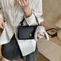 Elegant black lychee leather crossbody bag with silver lock and fluffy rabbit charm - Black with Pendant