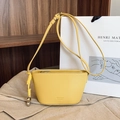 Bright yellow lychee textured leather mini crossbody bag with silver heart pendant - Yellow