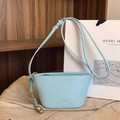 Chic light blue lychee pattern leather crossbody bag with adjustable shoulder strap - Blue