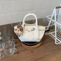 Minimalist beige bucket bag in PU leather with a cute khaki teddy bear keychain charm - White with Pendant