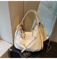 Detail of off-white PU leather hobo bag with teddy bear charm and side straps decoration - White with Pendant