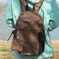 Brown plaid nylon backpack with side mesh pockets and matching mini pouch accessory - Brown